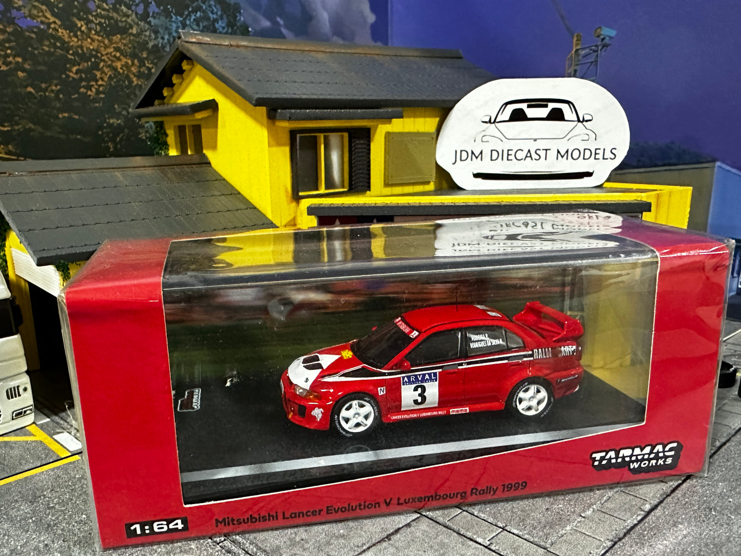 Tarmac Works Mitsubishi Lancer Evolution V Luxembourg Rally 1999 Madeira / Rodrigues da Silva Special Edition T64-012-99LUX03