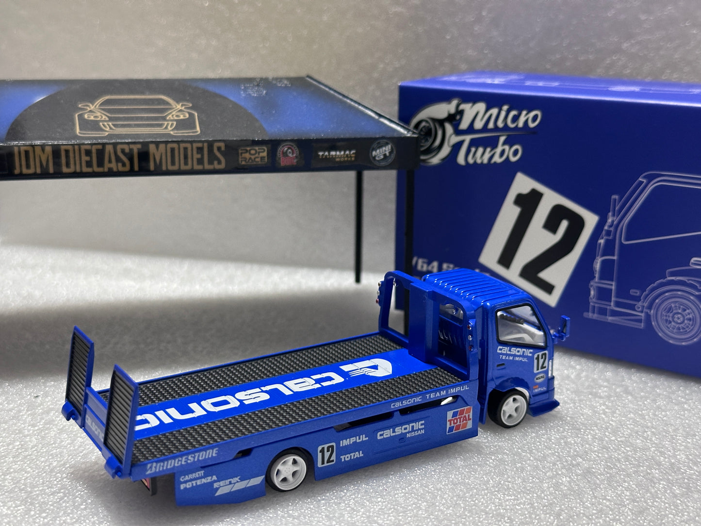 Micro Turbo Blue Calsonic H300 Flatbed Tow Truck Custom MT6405A10