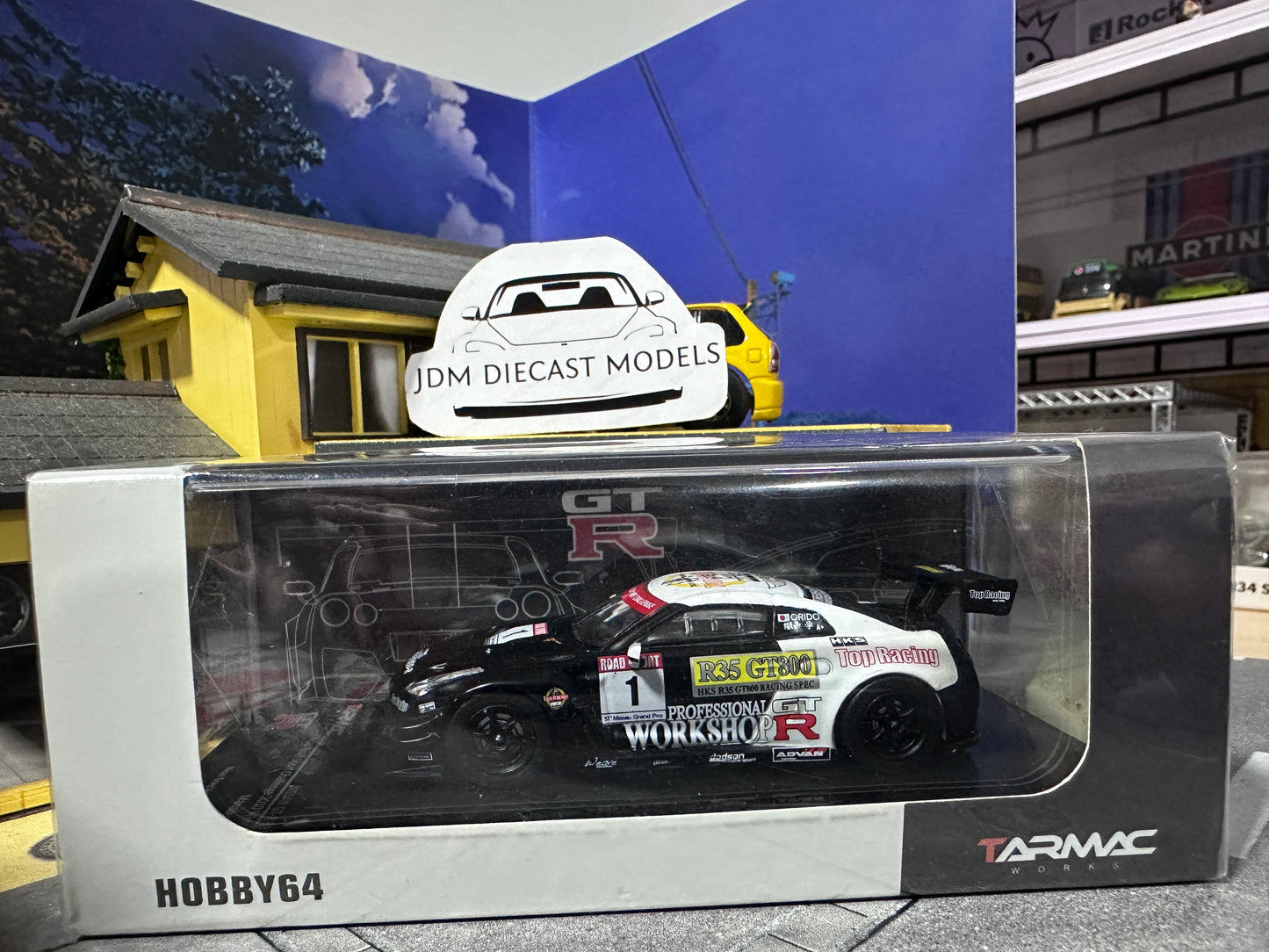 Tarmac Works 1/64 Nissan R35 Macau Road Sport Challenge 2010 Winner Manabu Orido