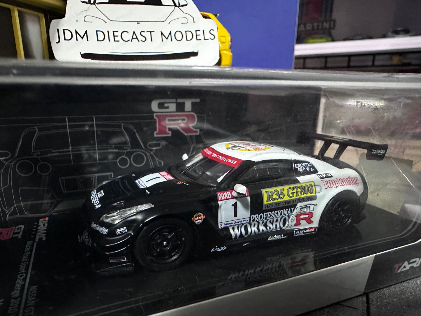 Tarmac Works 1/64 Nissan R35 Macau Road Sport Challenge 2010 Winner Manabu Orido