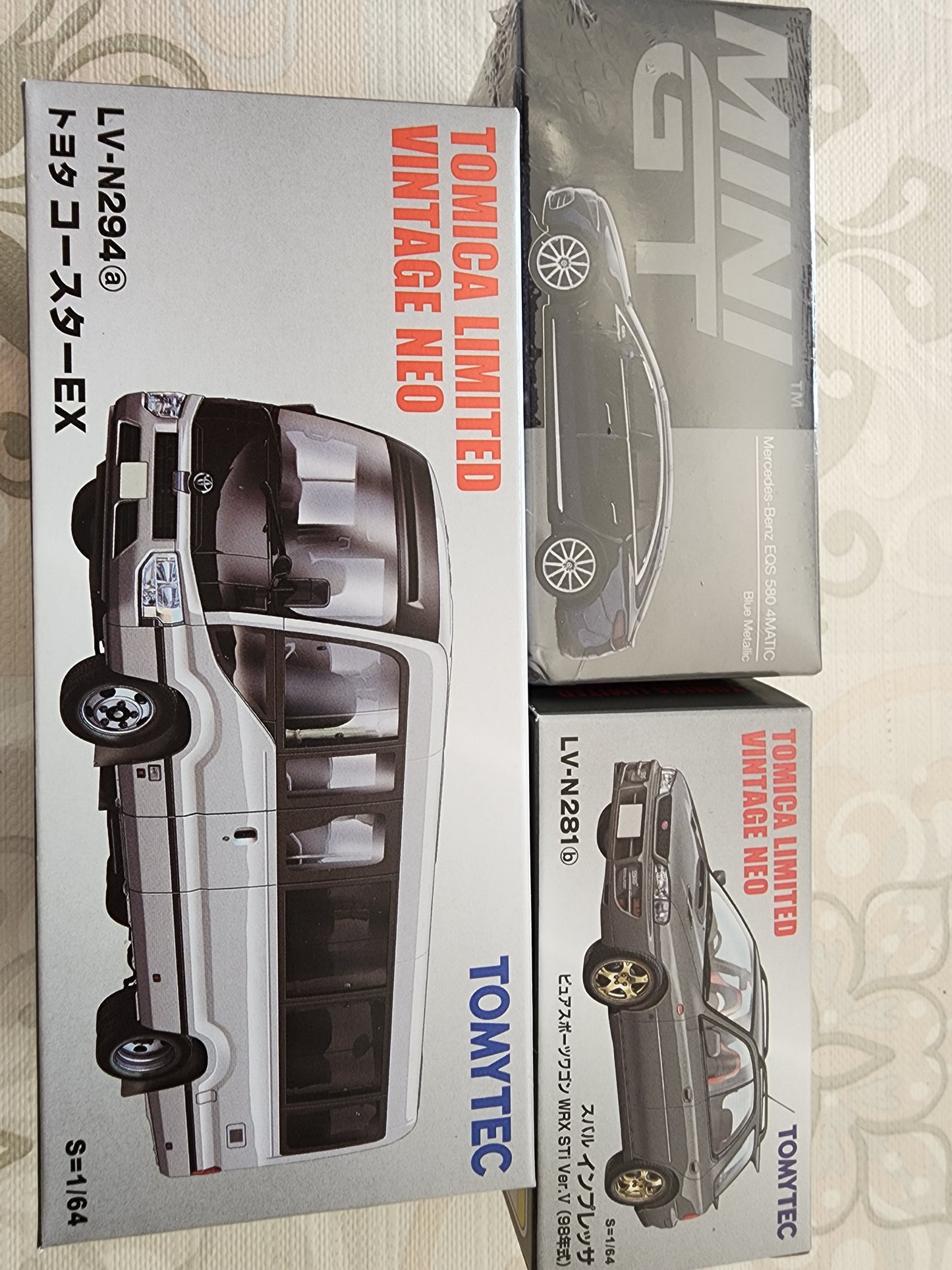 Tomica Limited Vintage Neo LV-N294a Toyota Coaster EX Silver + Grey Subaru + MiniGT 580 Blue Metallic