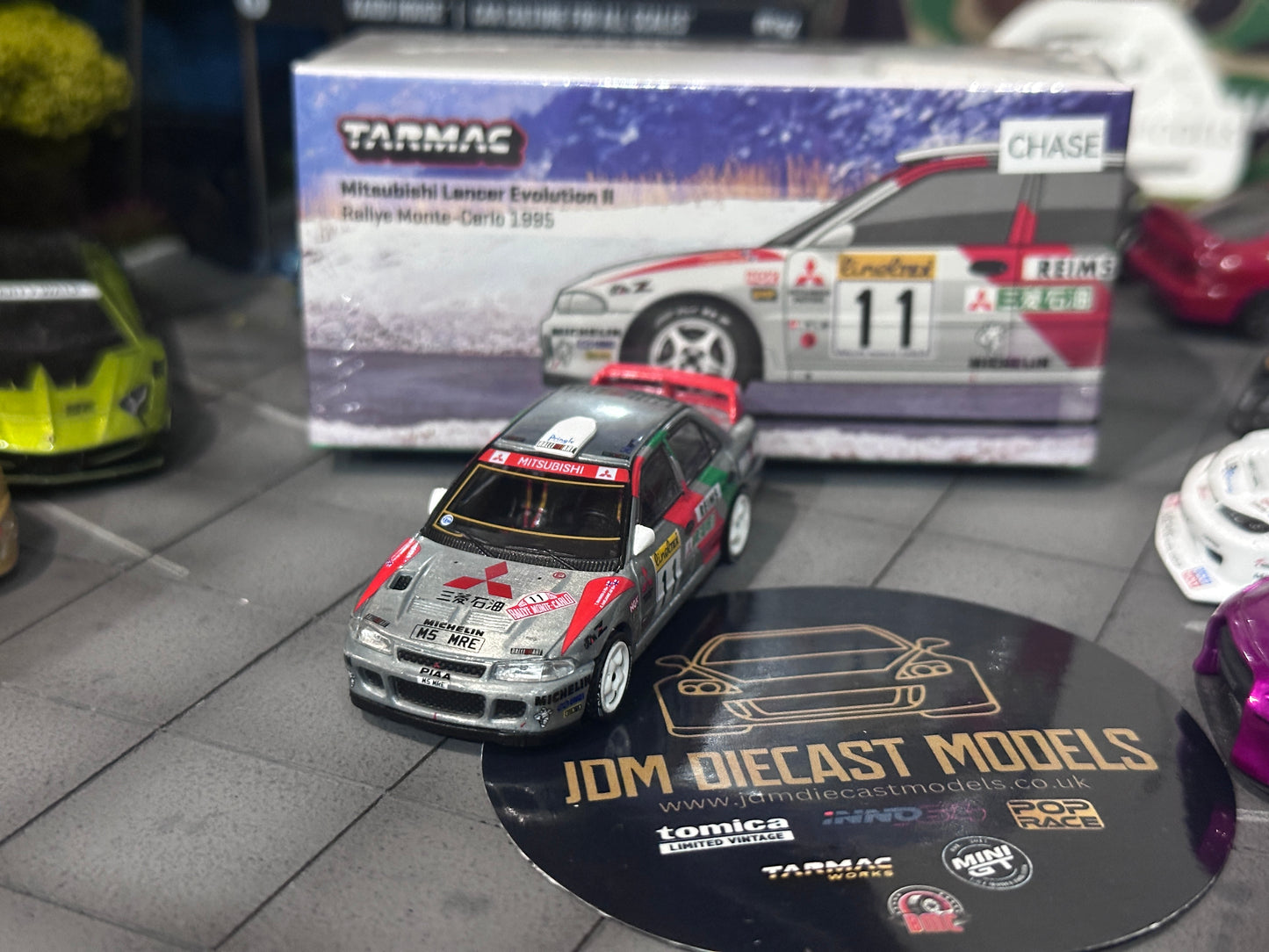 [Chase] Tarmac Works Mitsubishi Lancer Evolution II - Rallye Monte-Carlo 1995, T. Mäkinen / S. Harjanne T64G-049-95MCR11