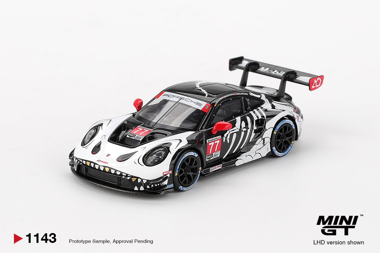 In STOCK MiniGT Porsche 911 GT3 R #77 AO Racing  2025 IMSA Petit Le Mans MGT01143