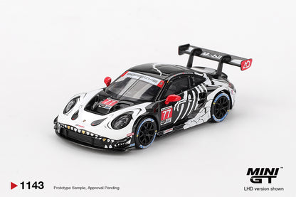 In STOCK MiniGT Porsche 911 GT3 R #77 AO Racing  2025 IMSA Petit Le Mans MGT01143
