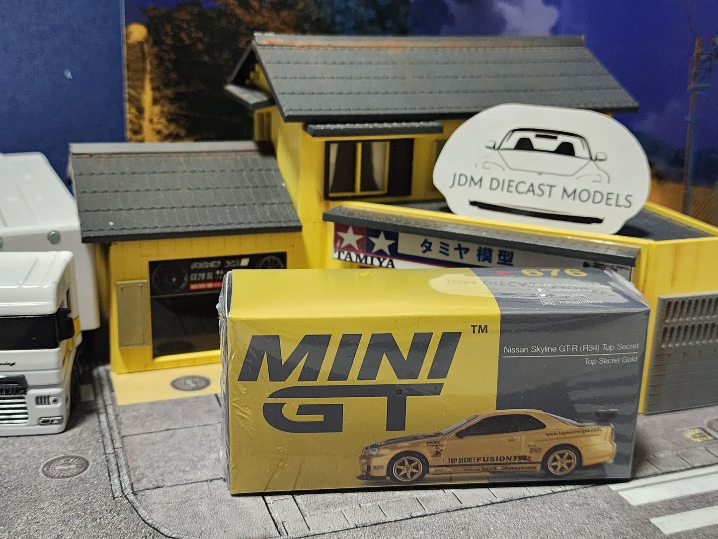 Mini GT Nissan Skyline GT-R (R34) Top Secret Top Secret Gold Japan Exclusive MGT00676-R