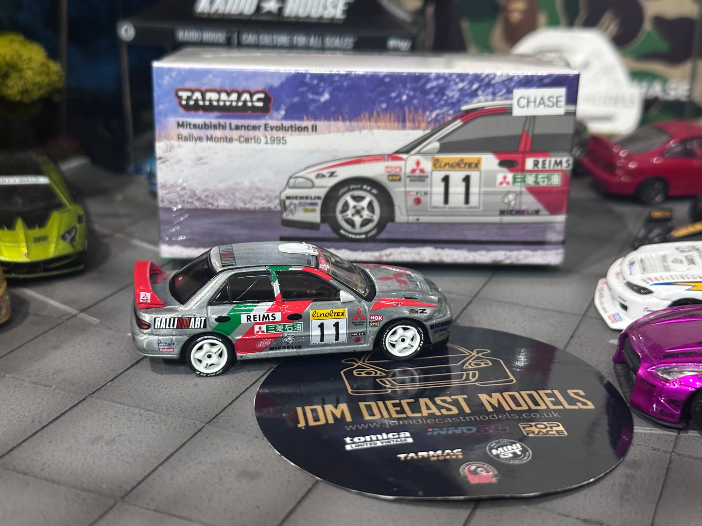 [Chase] Tarmac Works Mitsubishi Lancer Evolution II - Rallye Monte-Carlo 1995, T. Mäkinen / S. Harjanne T64G-049-95MCR11