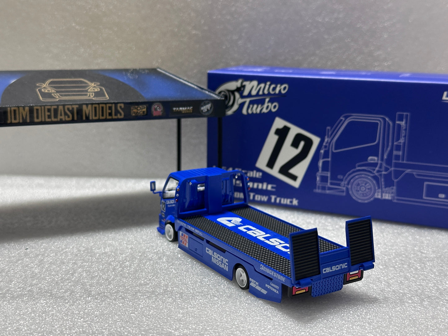 Micro Turbo Blue Calsonic H300 Flatbed Tow Truck Custom MT6405A10