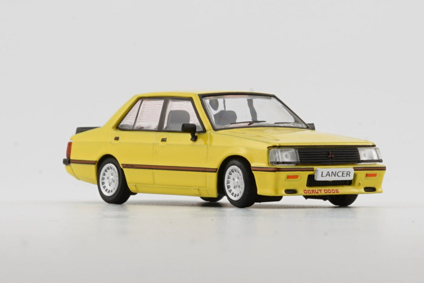 BM Creations Mitsubishi Lancer EX2000 Turbo Yellow (RHD) 64B0212