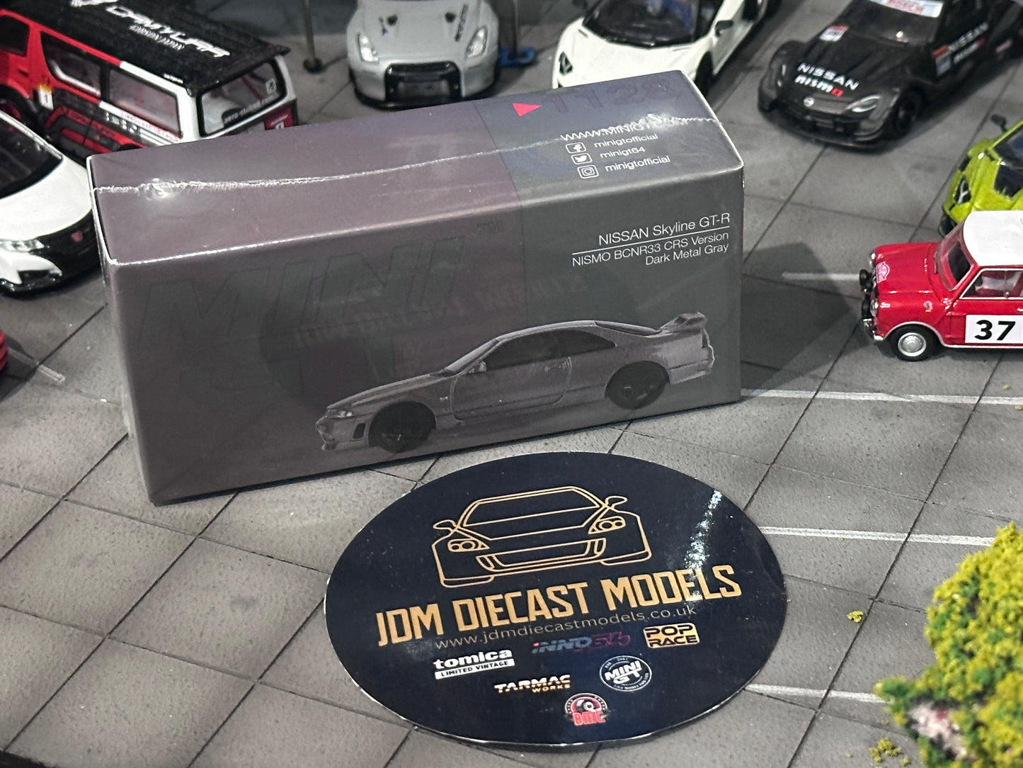 Mini GT Nissan Skyline GT-R NISMO BCNR33 CRS Version Dark Metal Grey  MGT01128