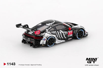 In STOCK MiniGT Porsche 911 GT3 R #77 AO Racing  2025 IMSA Petit Le Mans MGT01143