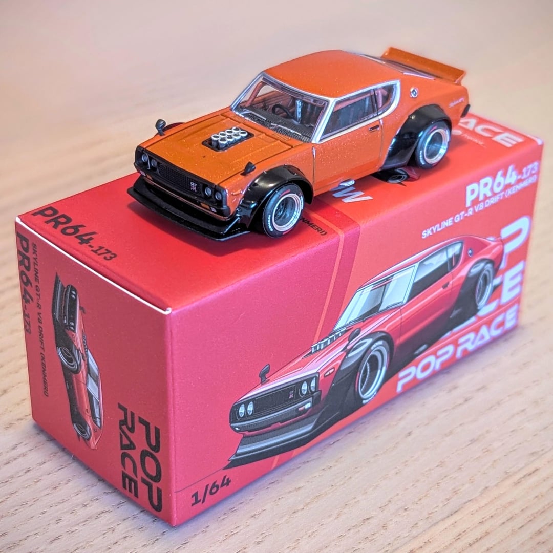 Poprace 1/64 Nissan Skyline KPGC110 Kenmari Orange PR64-173